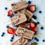chocolate-protein-popsicles-with-fruit-and-granola-toppings